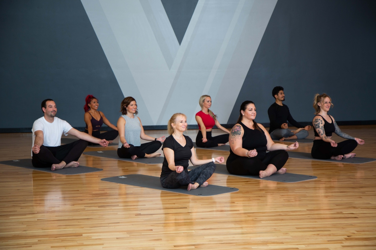 The Benefits of Selfcare. A group of people meditating