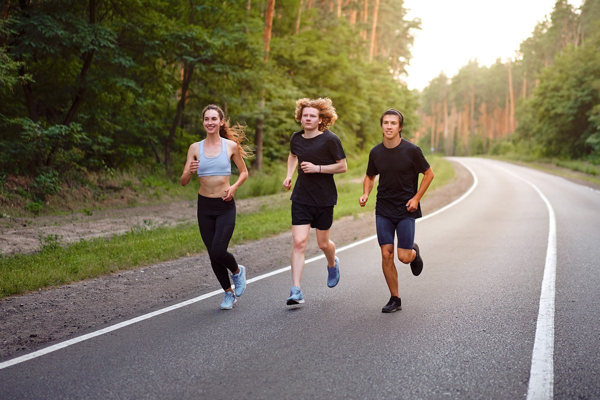 Three friends running together