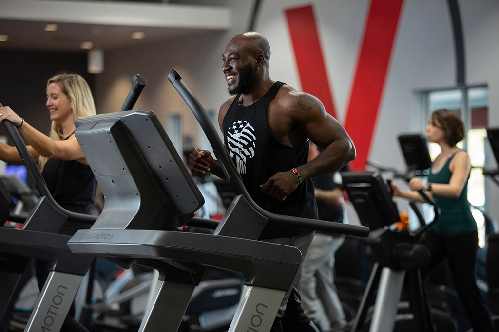 Male athlete running on treadmill at VASA Fitness