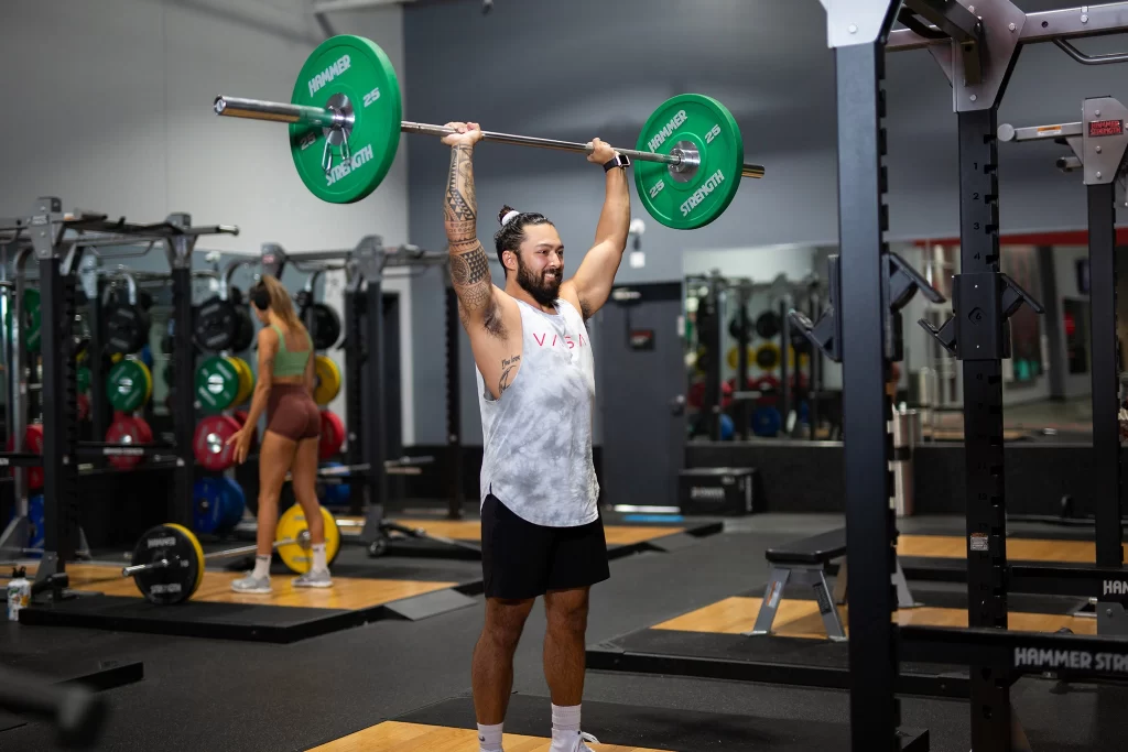 Male athlete power lifting in VASA Fitness