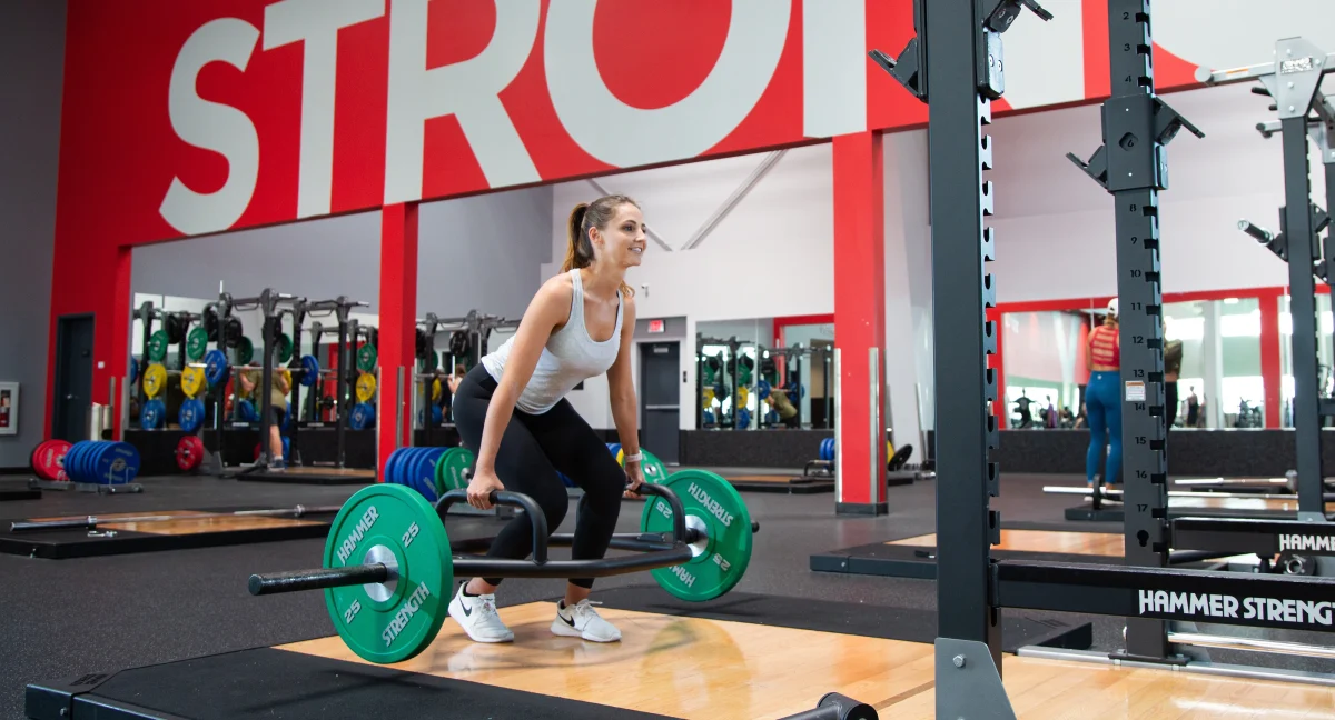 Female athlete working out in the performance lifting area at VASA Fitness