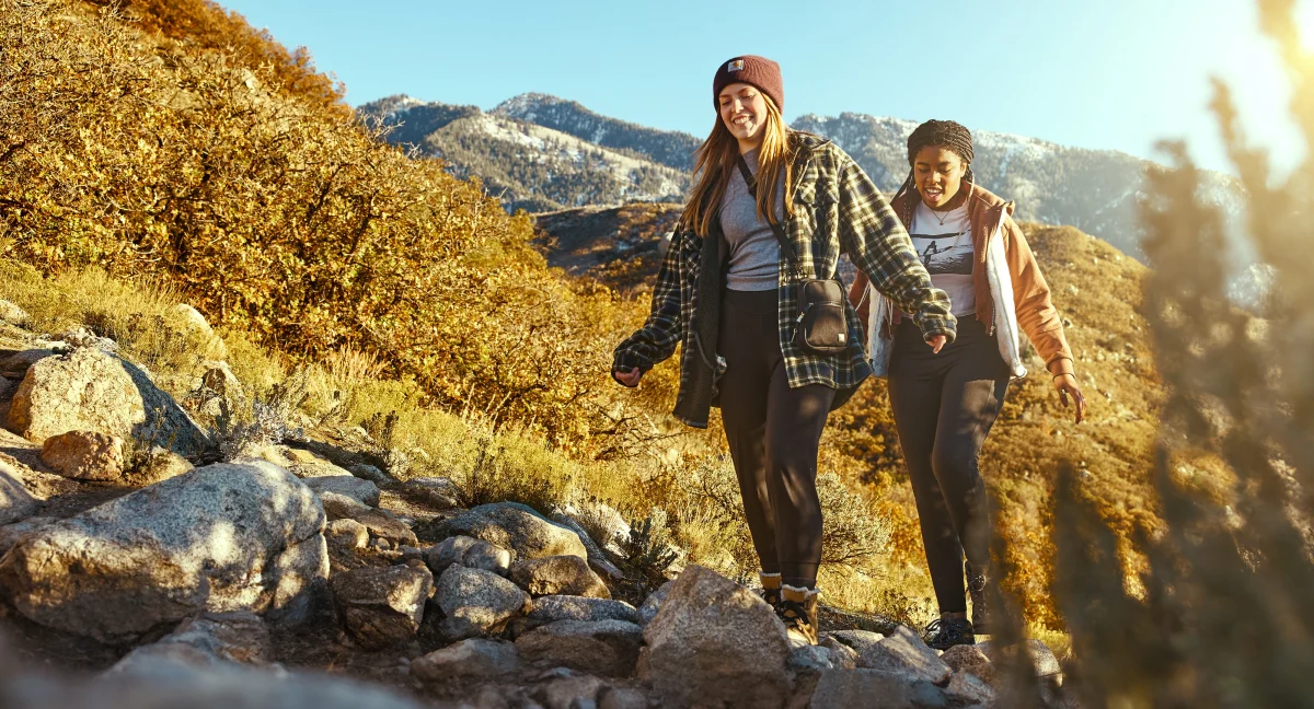 Two young women on a hiking trail